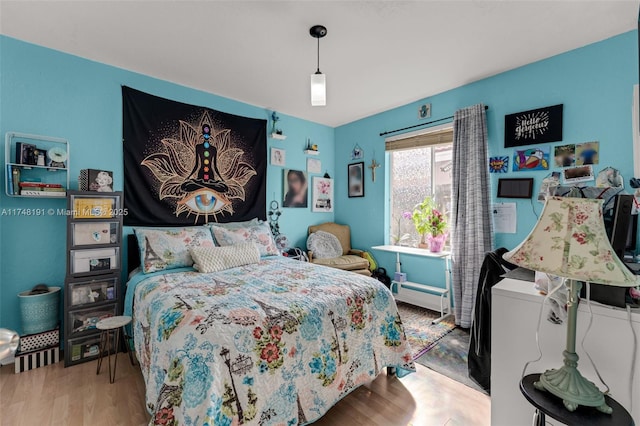 bedroom featuring light wood-type flooring