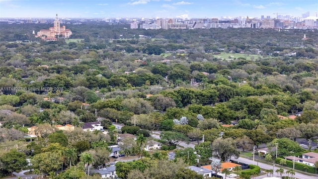 birds eye view of property with a city view