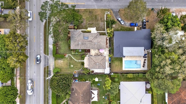 birds eye view of property with a residential view