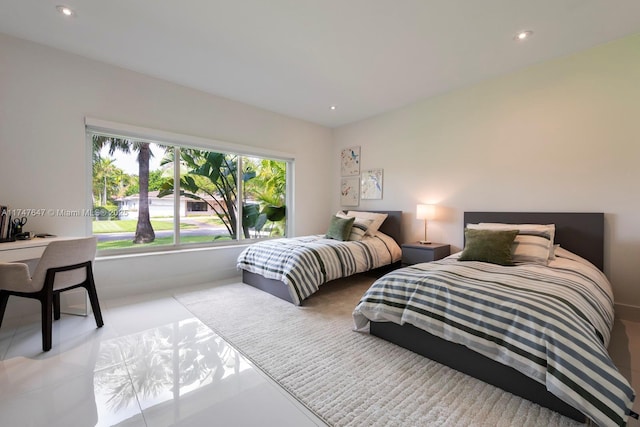 tiled bedroom with recessed lighting