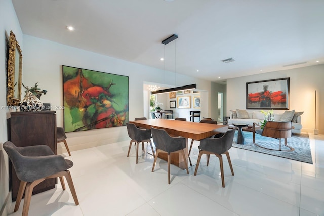 dining room with recessed lighting and visible vents