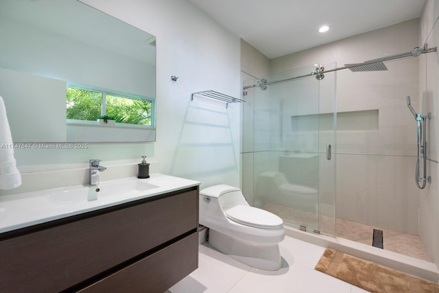bathroom featuring vanity, recessed lighting, tile patterned flooring, a shower stall, and toilet