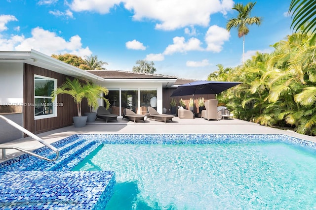 pool with a patio