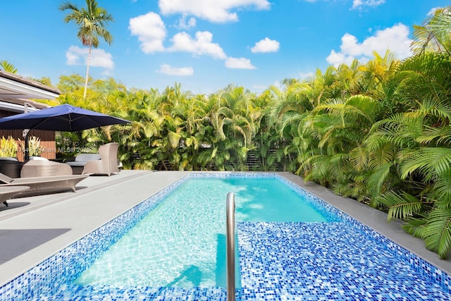 pool with a patio