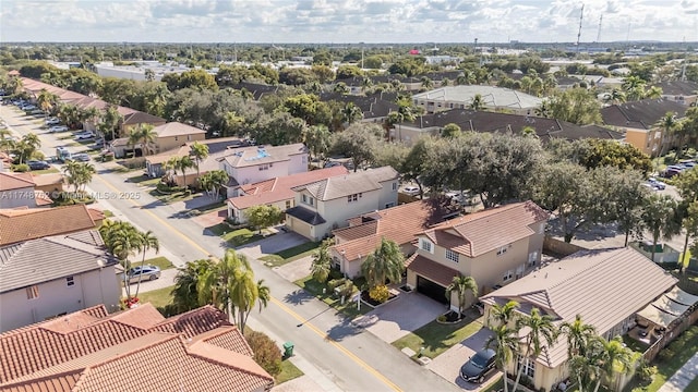 birds eye view of property with a residential view