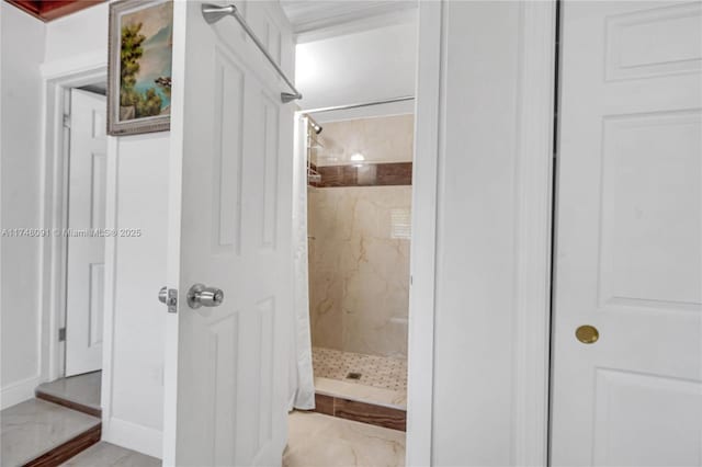 bathroom with a shower stall