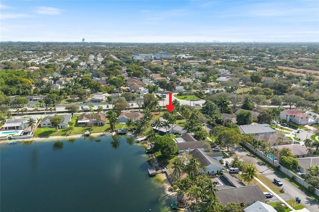 bird's eye view featuring a residential view and a water view