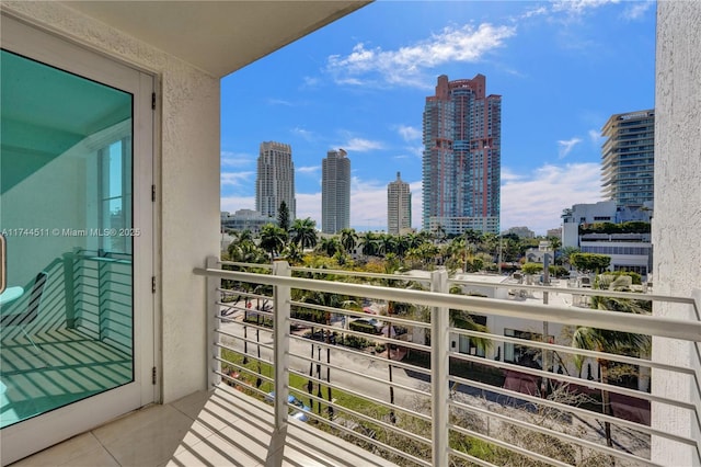 balcony featuring a view of city