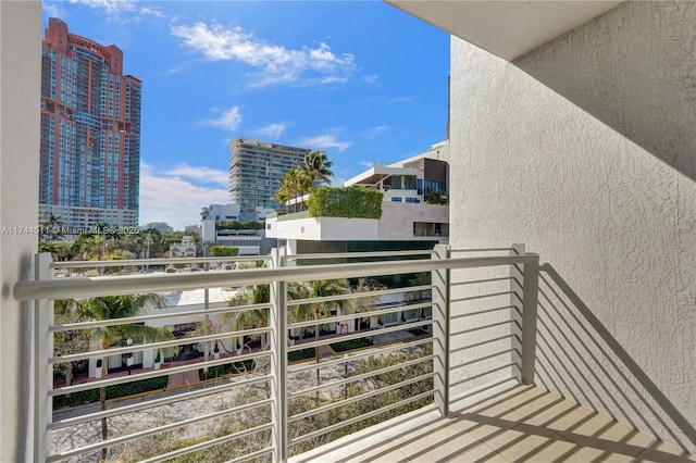 balcony featuring a city view