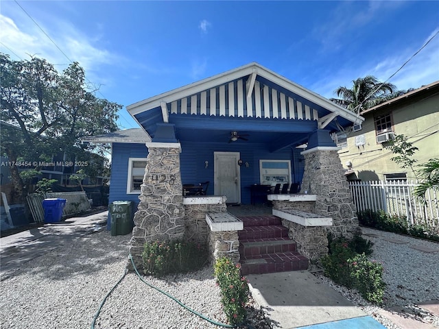 view of front of property featuring fence