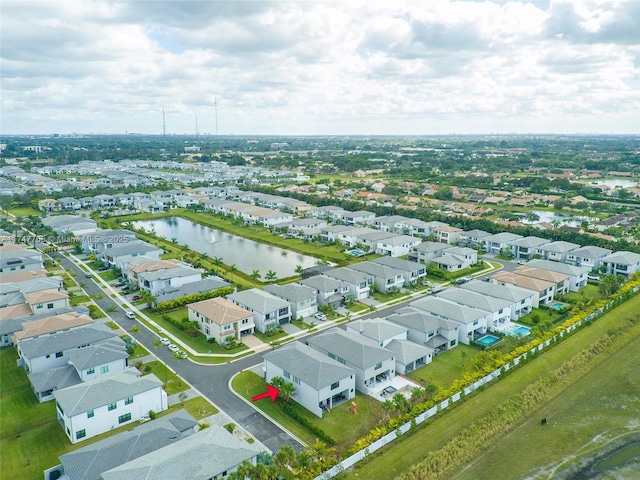 bird's eye view with a water view and a residential view