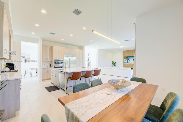 dining area with recessed lighting and visible vents