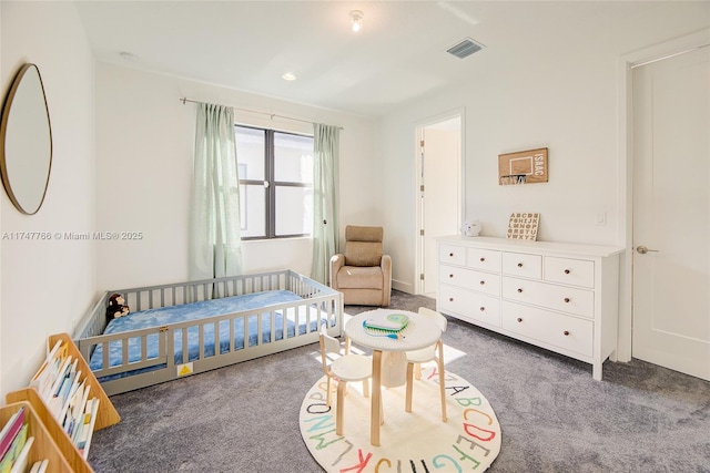 carpeted bedroom with visible vents