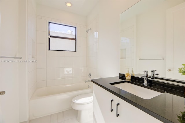 bathroom featuring shower / washtub combination, vanity, and toilet