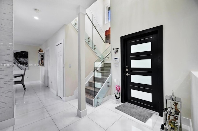 8851 SW 208th Ter, Cutler Bay, FL 33189 - foyer with baseboards, recessed lighting, stairway, and light tile patterned floors