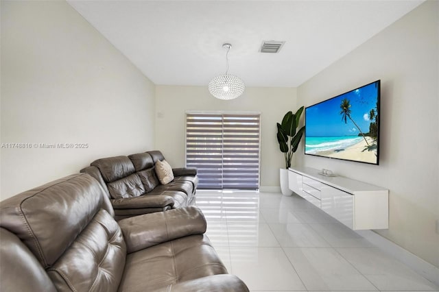 8851 SW 208th Ter, Cutler Bay, FL 33189 - living room featuring baseboards, visible vents, and light tile patterned floors