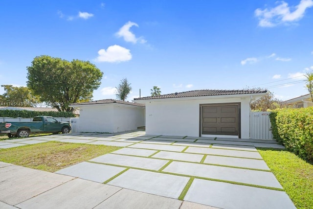 garage featuring fence