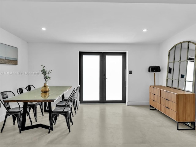 dining room featuring recessed lighting, french doors, and baseboards