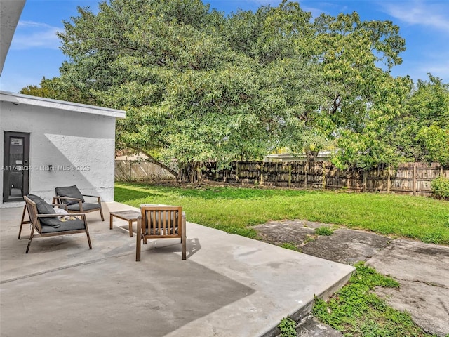 view of patio with a fenced backyard