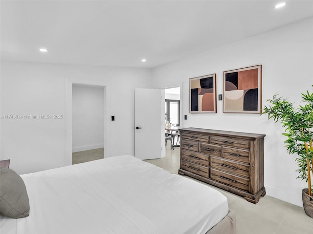 bedroom featuring recessed lighting and baseboards