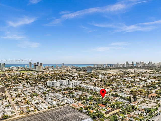 bird's eye view with a view of city and a water view