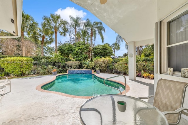 view of swimming pool with a patio, a fenced backyard, and a fenced in pool