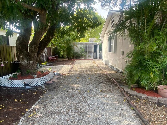 view of yard with a fenced backyard and a patio area