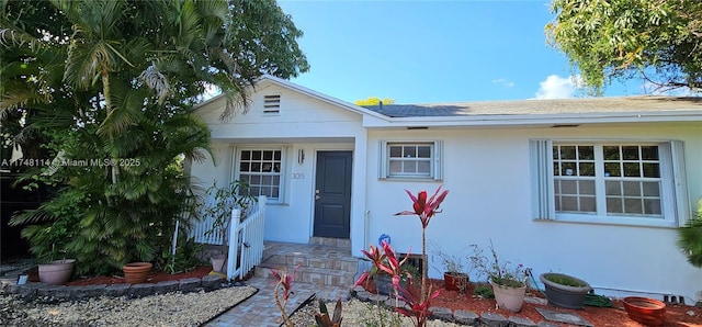 view of front of home featuring stucco siding