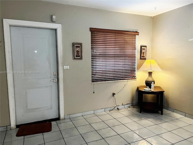 3015 SW 24th Ter, Miami, FL 33145 - entrance foyer featuring light tile patterned flooring and baseboards