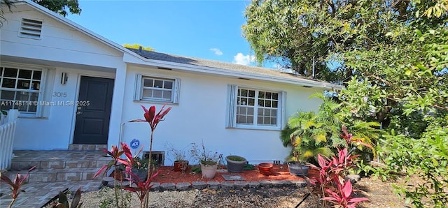 view of front of property featuring stucco siding