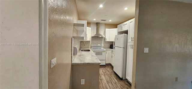 kitchen featuring white appliances, decorative backsplash, open shelves, wall chimney range hood, and dark wood-type flooring