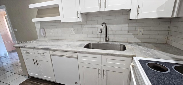 kitchen featuring white cabinetry, open shelves, a sink, white appliances, and backsplash
