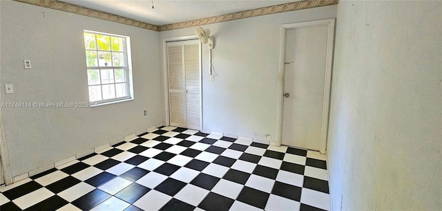 empty room with tile patterned floors