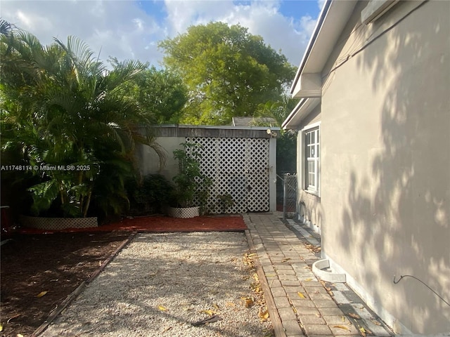 view of yard with a patio and fence