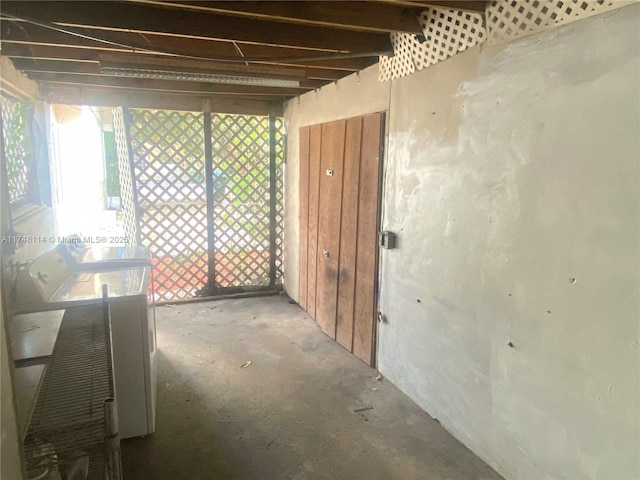 misc room with concrete flooring