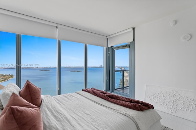 bedroom with a water view