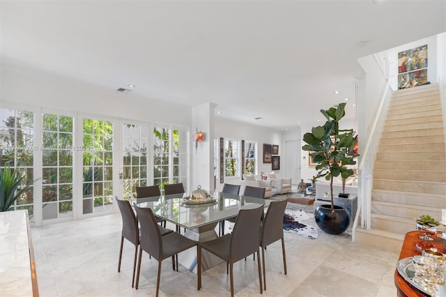 dining area featuring recessed lighting, visible vents, and stairs