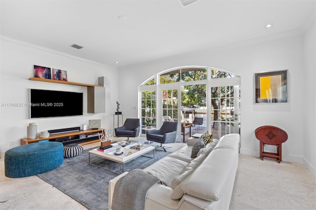 living area featuring ornamental molding, recessed lighting, visible vents, and baseboards