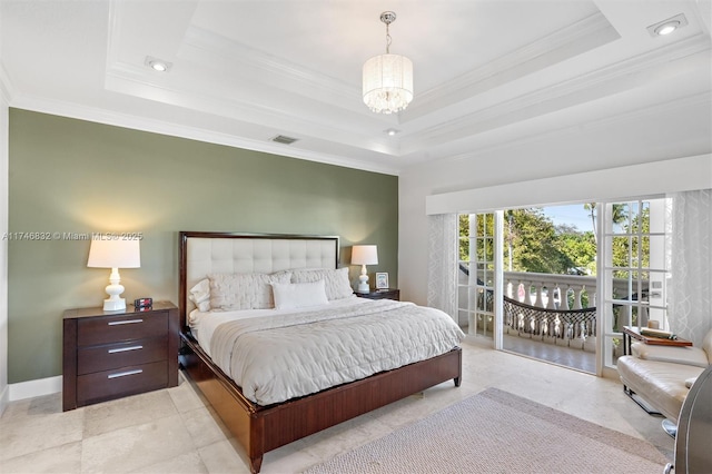 bedroom featuring an inviting chandelier, visible vents, a raised ceiling, and ornamental molding