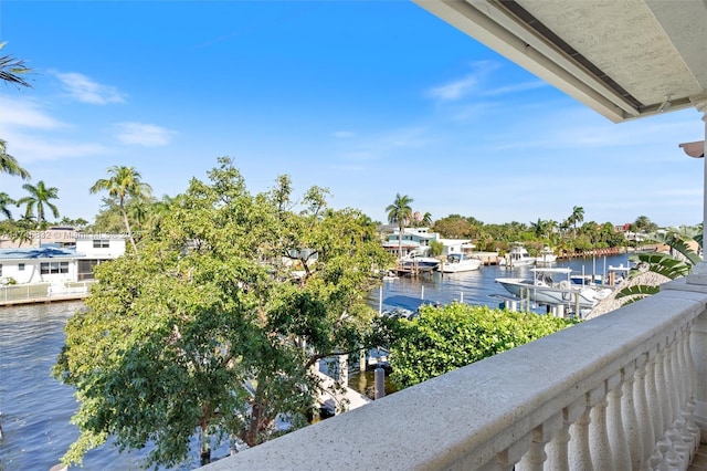 balcony featuring a water view