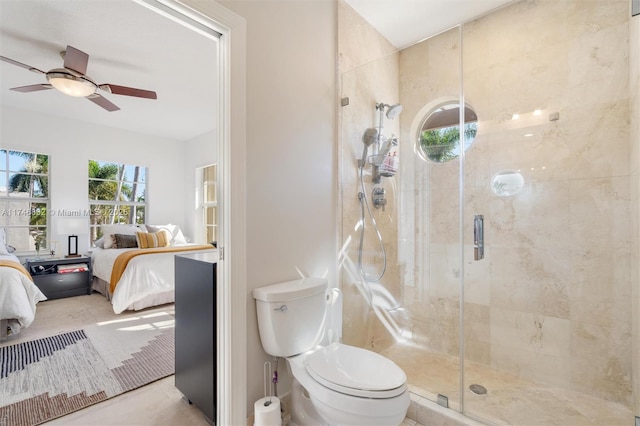 ensuite bathroom with toilet, ensuite bath, ceiling fan, tile patterned flooring, and a shower stall