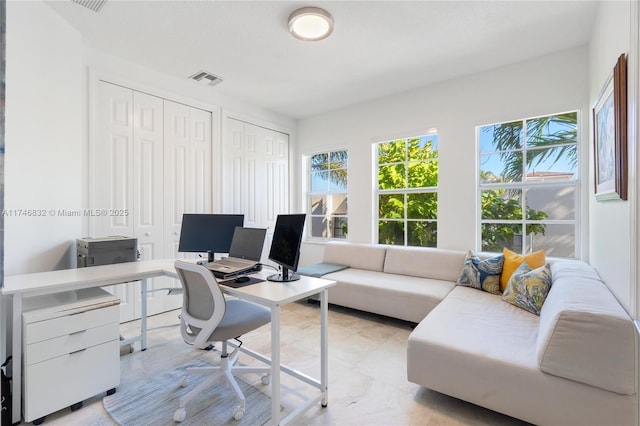 office area featuring visible vents