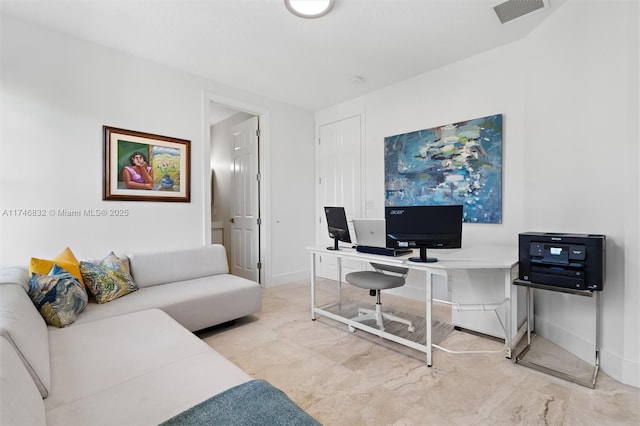 office area with baseboards and visible vents