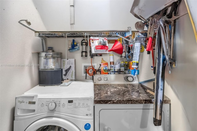 clothes washing area with laundry area and washing machine and dryer