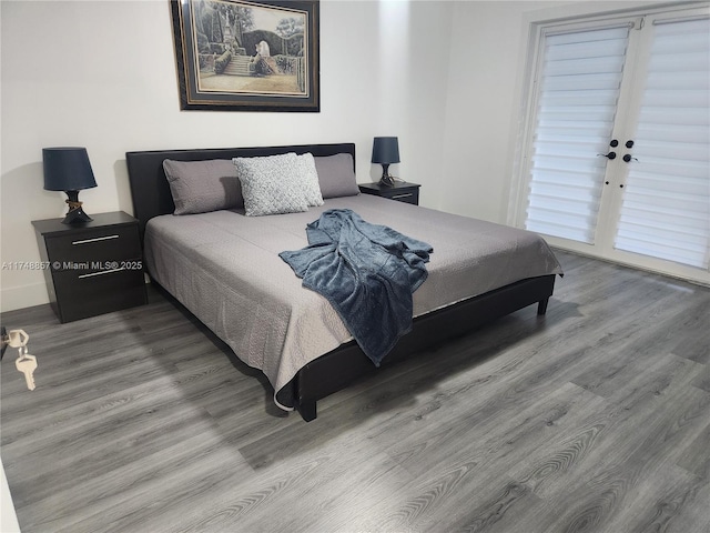 bedroom featuring wood finished floors