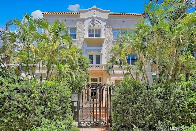 view of property featuring fence