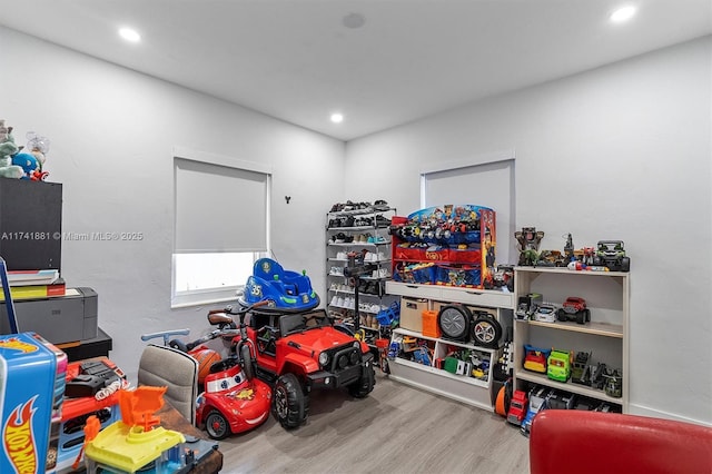 recreation room featuring recessed lighting and light wood-style floors