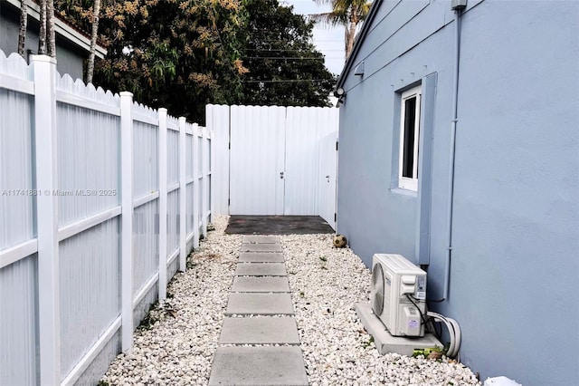 view of yard featuring ac unit and a fenced backyard