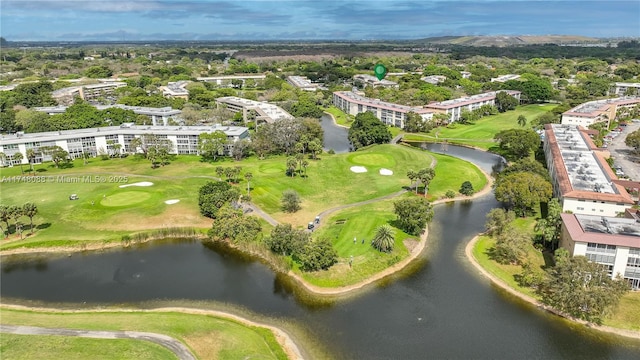 bird's eye view with golf course view and a water view