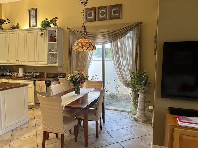 dining room with light tile patterned flooring